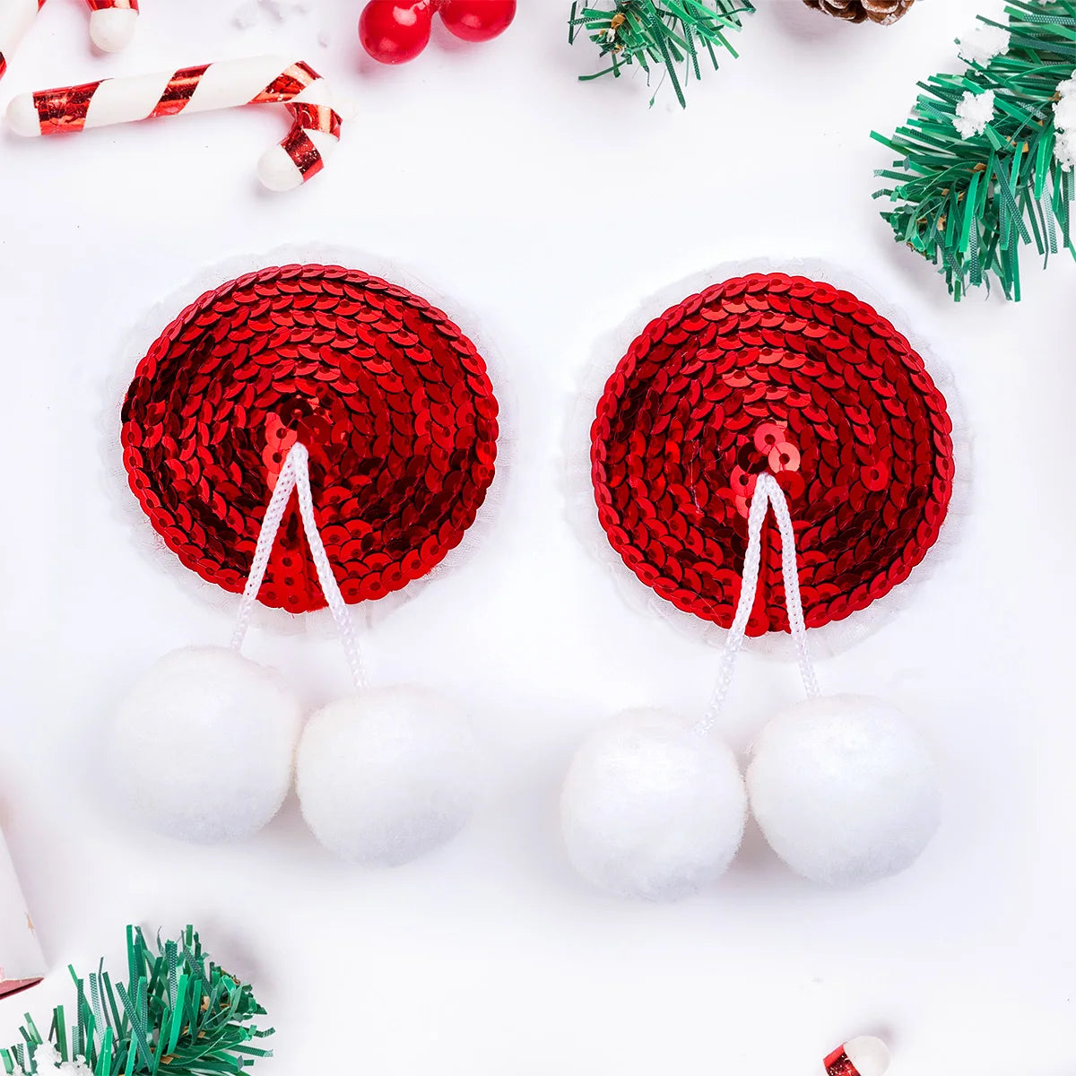 Cache-tétons en pompons Noël